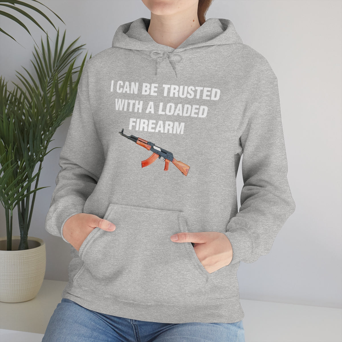 I CAN BE TRUSTED WITH A LOADED FIREARM HOODIE