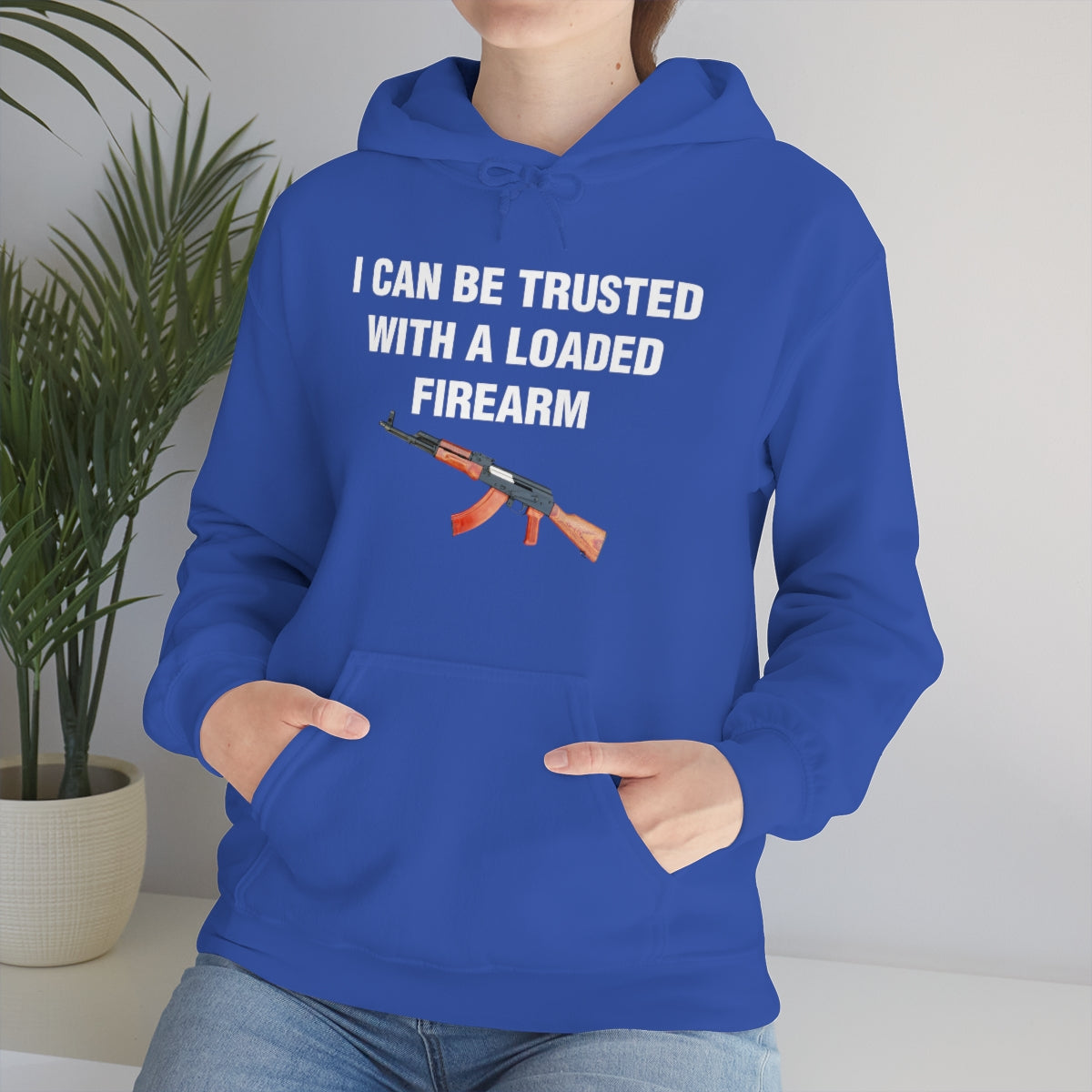 I CAN BE TRUSTED WITH A LOADED FIREARM HOODIE