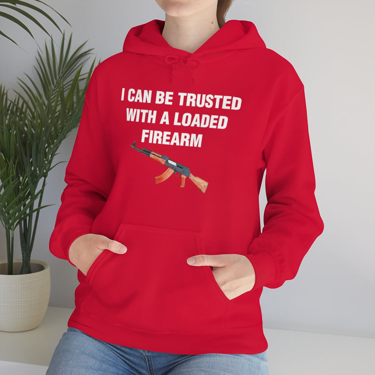 I CAN BE TRUSTED WITH A LOADED FIREARM HOODIE