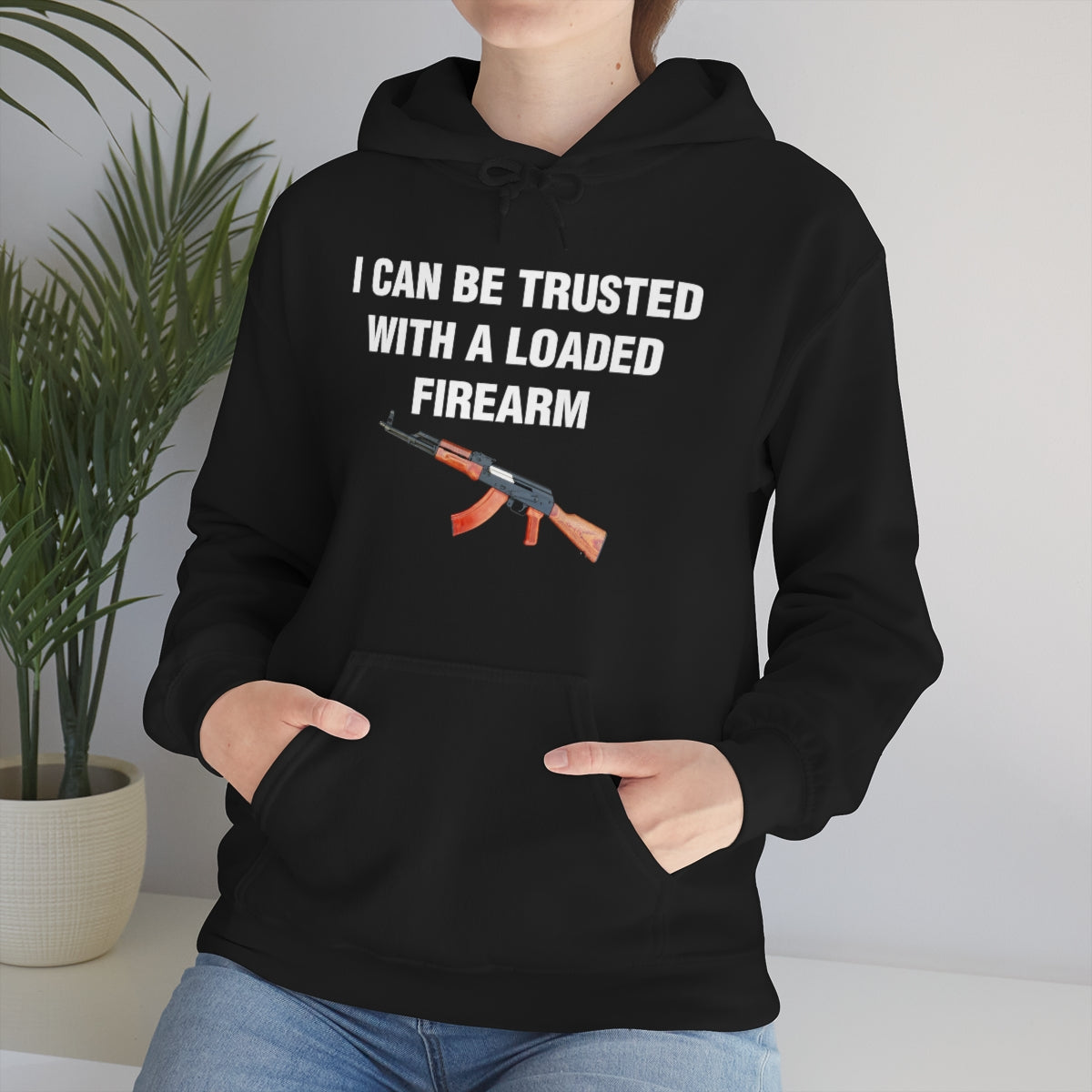 I CAN BE TRUSTED WITH A LOADED FIREARM HOODIE